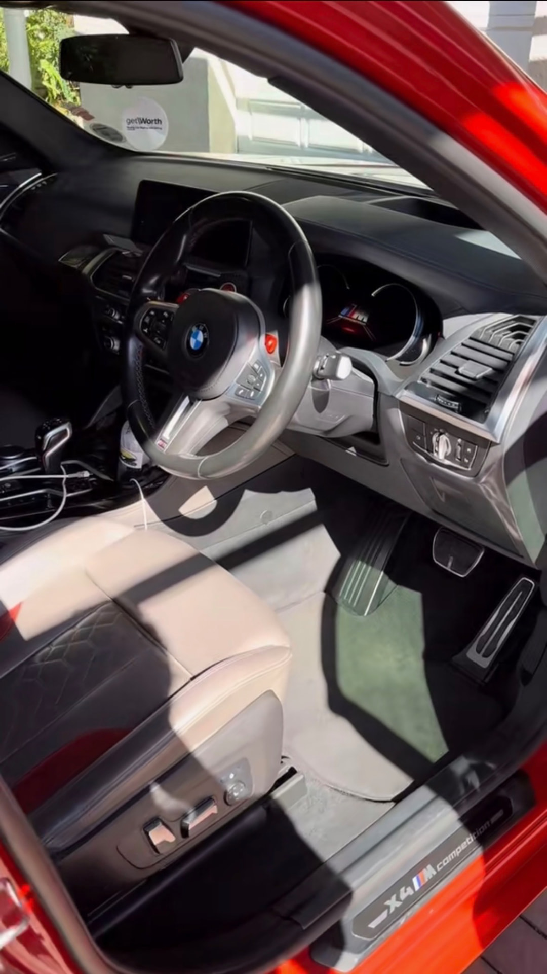 BMW X4 M Competition interior with cream leather cleaned and protected